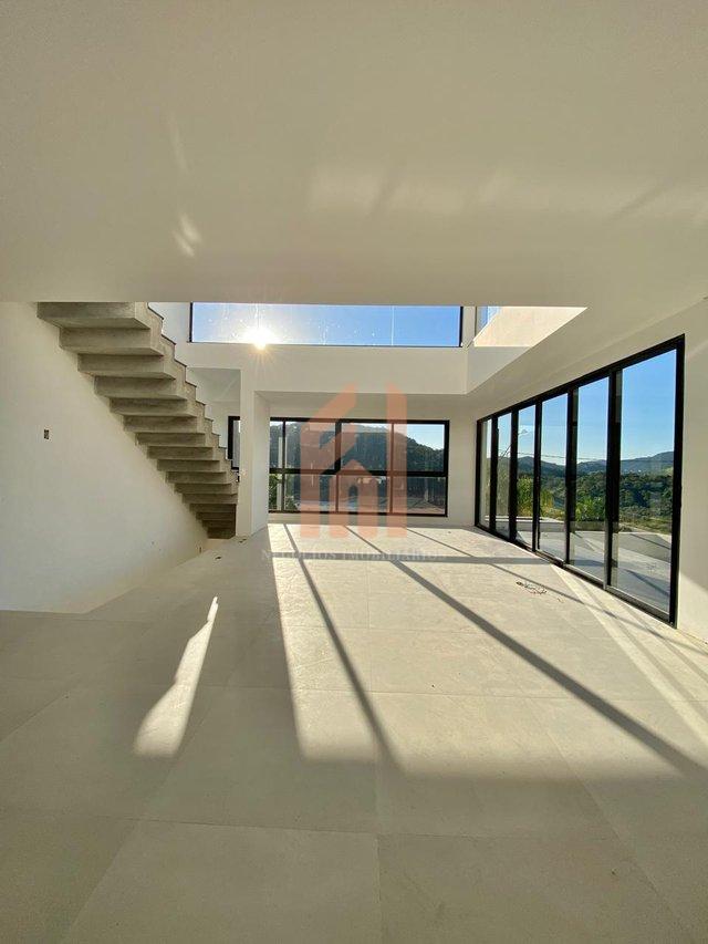 Casa em condomínio fechado com 03 suítes e incrível vista para área de preservação Rua Joaquim Garcia Camboriú - 
