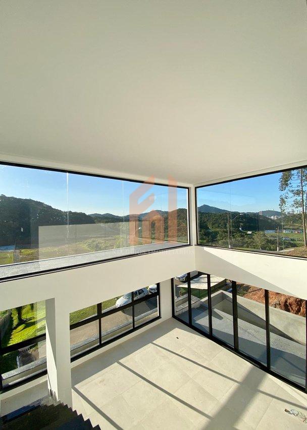 Casa em condomínio fechado com 03 suítes e incrível vista para área de preservação Rua Joaquim Garcia Camboriú - 