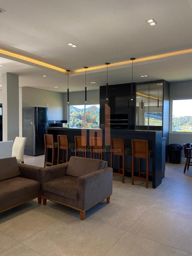 Casa em condomínio fechado com 03 suítes e incrível vista para área de preservação Rua Joaquim Garcia Camboriú - 